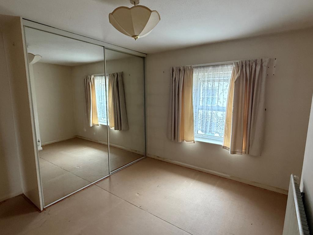 Lot: 145 - HOUSE IN NEED OF IMPROVEMENT - Bedroom of House in need of Improvement